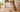 Dog beside a bowl of wet food in a warm, minimalist kitchen